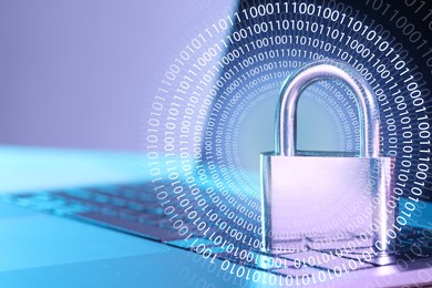 Image of Padlock on laptop, closeup. Binary code. Cyber security