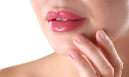 Photo of Woman with beautiful pink lipstick on her lips against white background, closeup