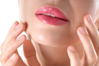 Photo of Woman with beautiful pink lipstick on her lips against white background, closeup