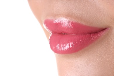 Photo of Woman with beautiful pink lipstick on her lips against white background, closeup