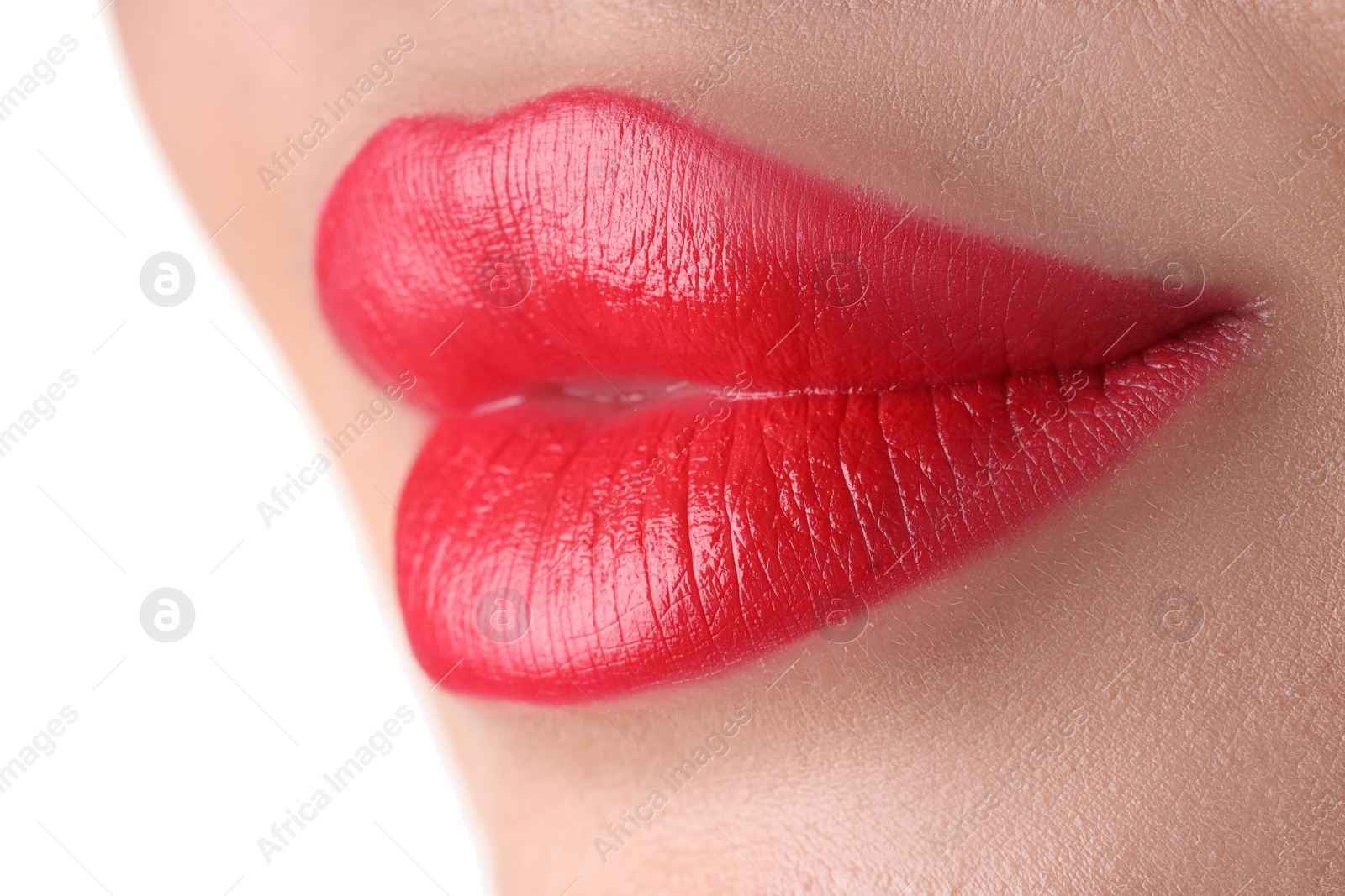Photo of Woman with beautiful red lipstick on her lips against white background, closeup