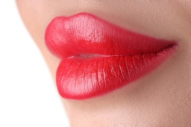 Photo of Woman with beautiful red lipstick on her lips against white background, closeup