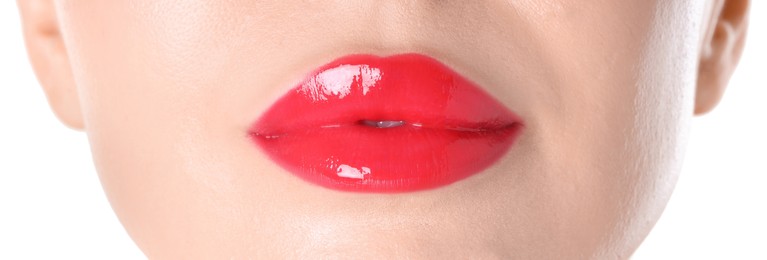 Photo of Woman with beautiful red lipstick on her lips against white background, closeup