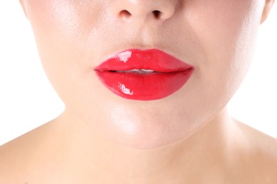 Photo of Woman with beautiful red lipstick on her lips against white background, closeup