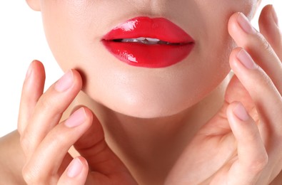 Photo of Woman with beautiful red lipstick on her lips against white background, closeup