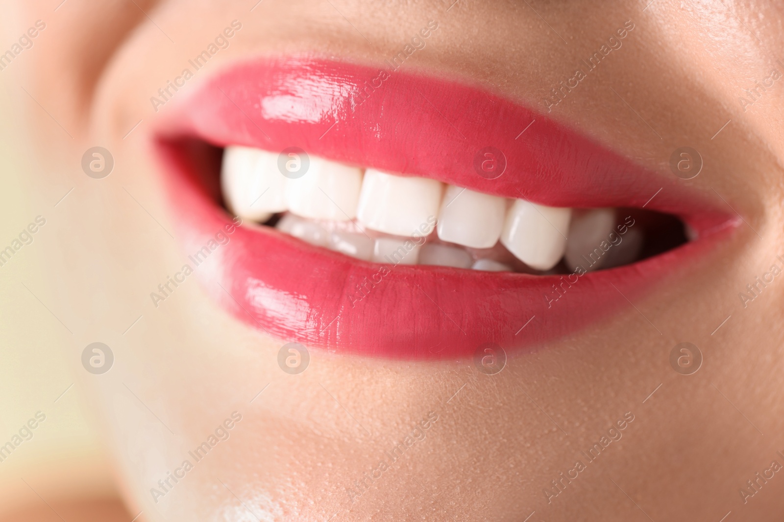 Photo of Woman with beautiful lipstick on her lips, macro view