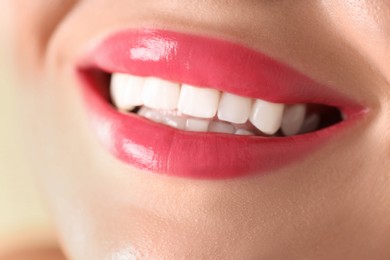 Photo of Woman with beautiful lipstick on her lips, macro view