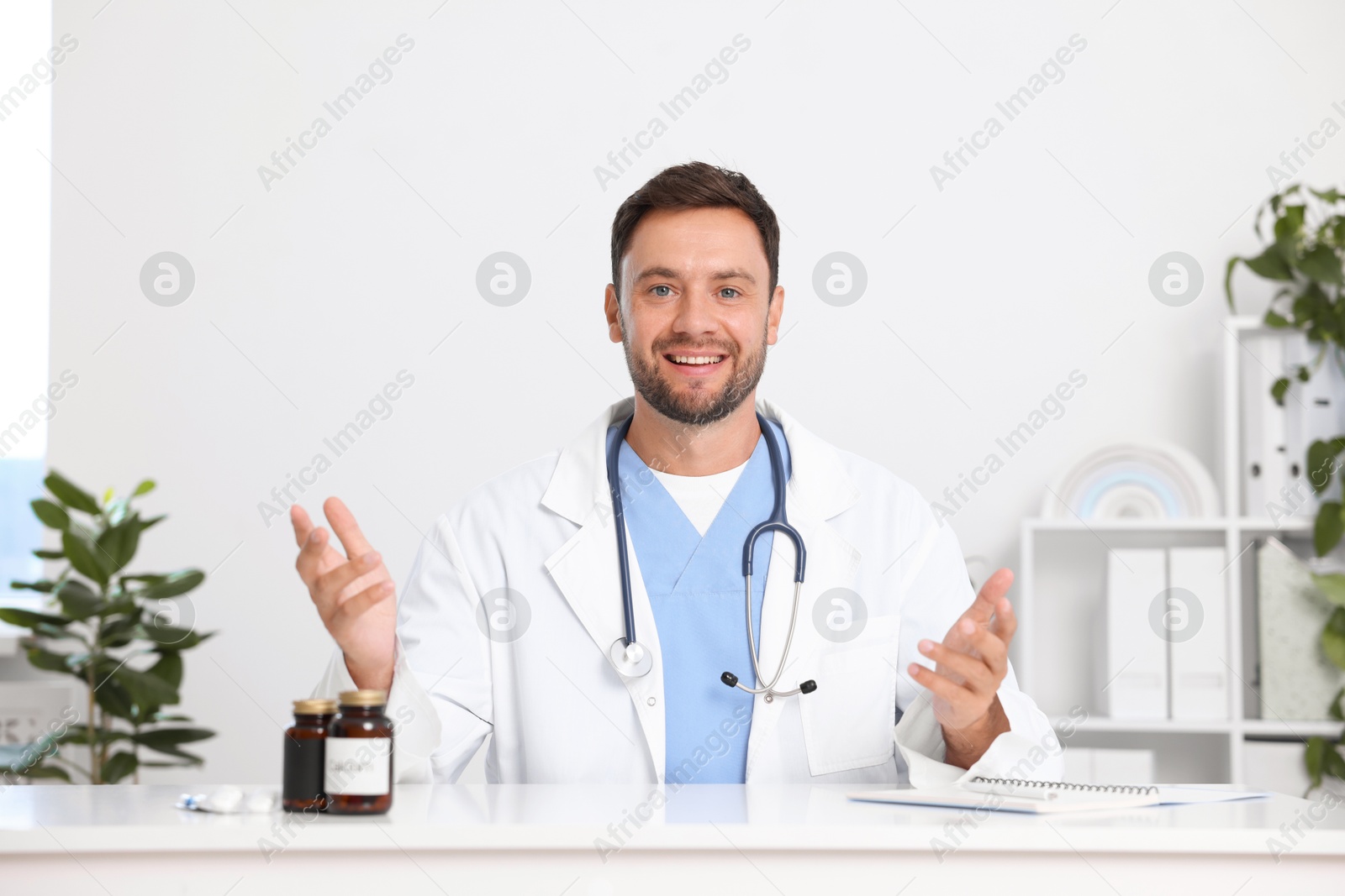 Pediatrician having video call with patient, view from camera Photo of Pediatrician having video call with patient, view from camera