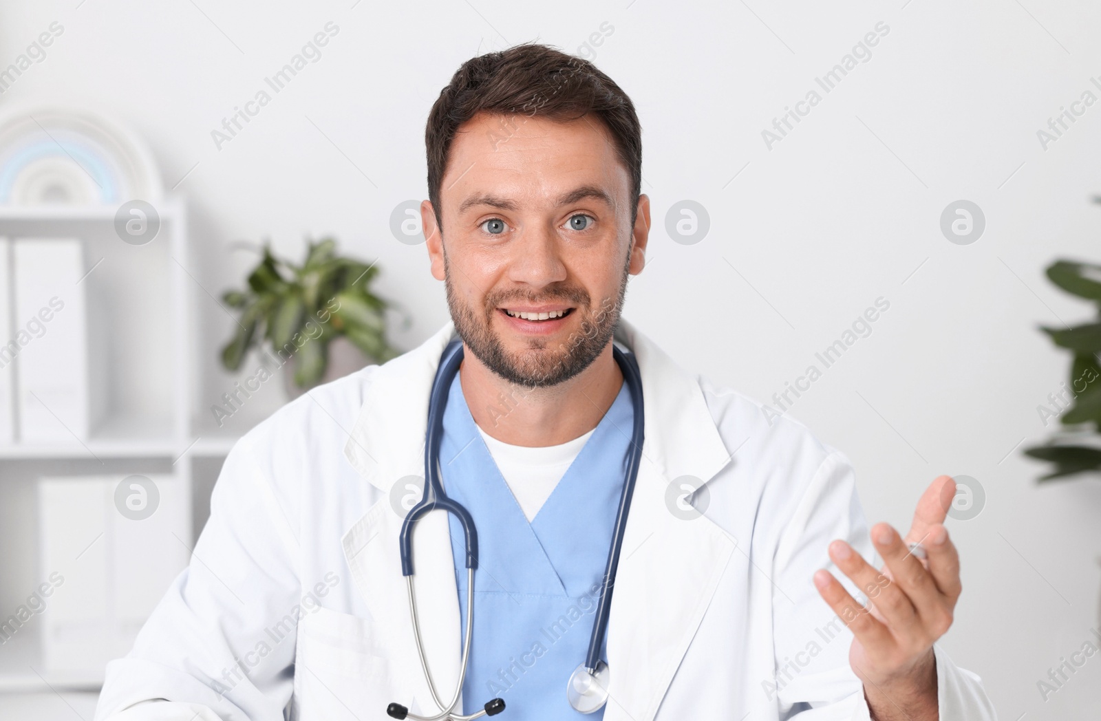 Pediatrician having video call with patient, view from camera Photo of Pediatrician having video call with patient, view from camera