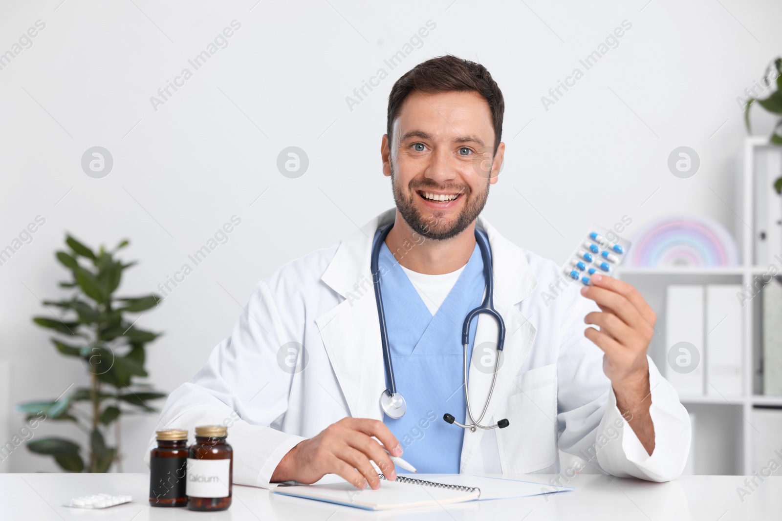 Photo of Pediatrician recommending pills during video call with patient, view from camera