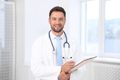 Photo of Pediatrician with stethoscope and clipboard in hospital