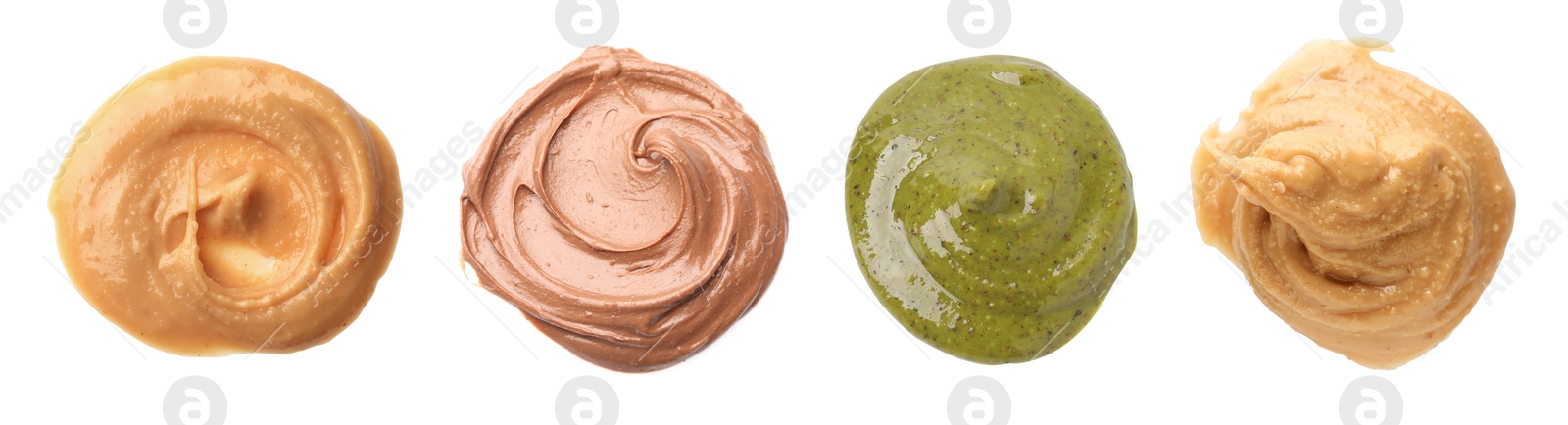 Image of Smooth and velvety food texture. Spreads of different nuts isolated on white, set. Top view