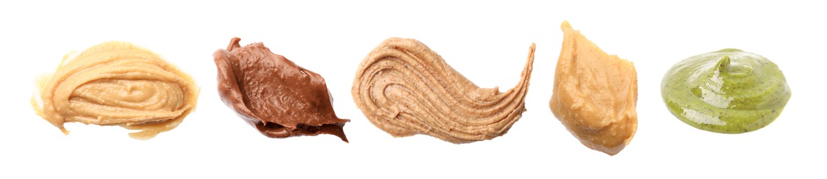 Image of Smooth and velvety food texture. Spreads of different nuts isolated on white, set