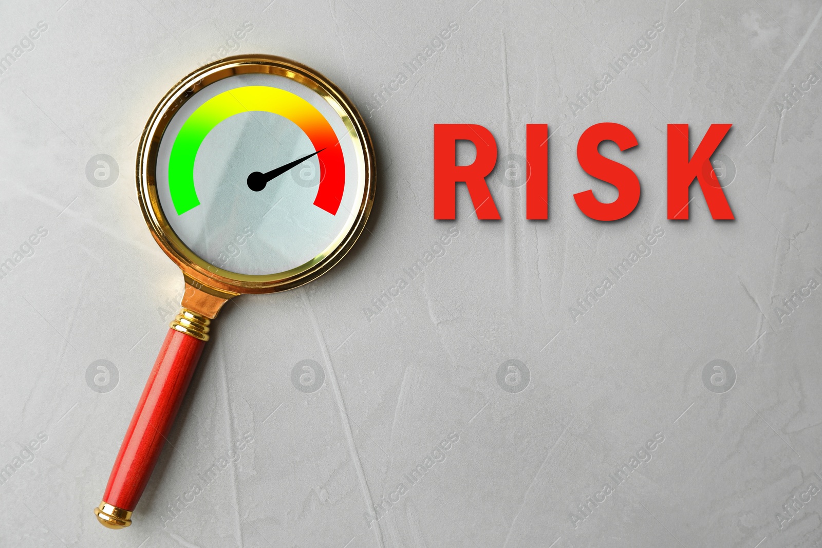 Image of Risk word and magnifying glass with scale inside on grey background, top view