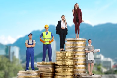 Image of People of various professions standing on different stacks of coins according to their salaries against blurred cityscape. Concept of rich, wealth
