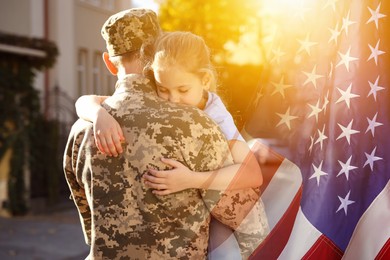 Image of Military man and his daughter outdoors, double exposure with national flag of USA