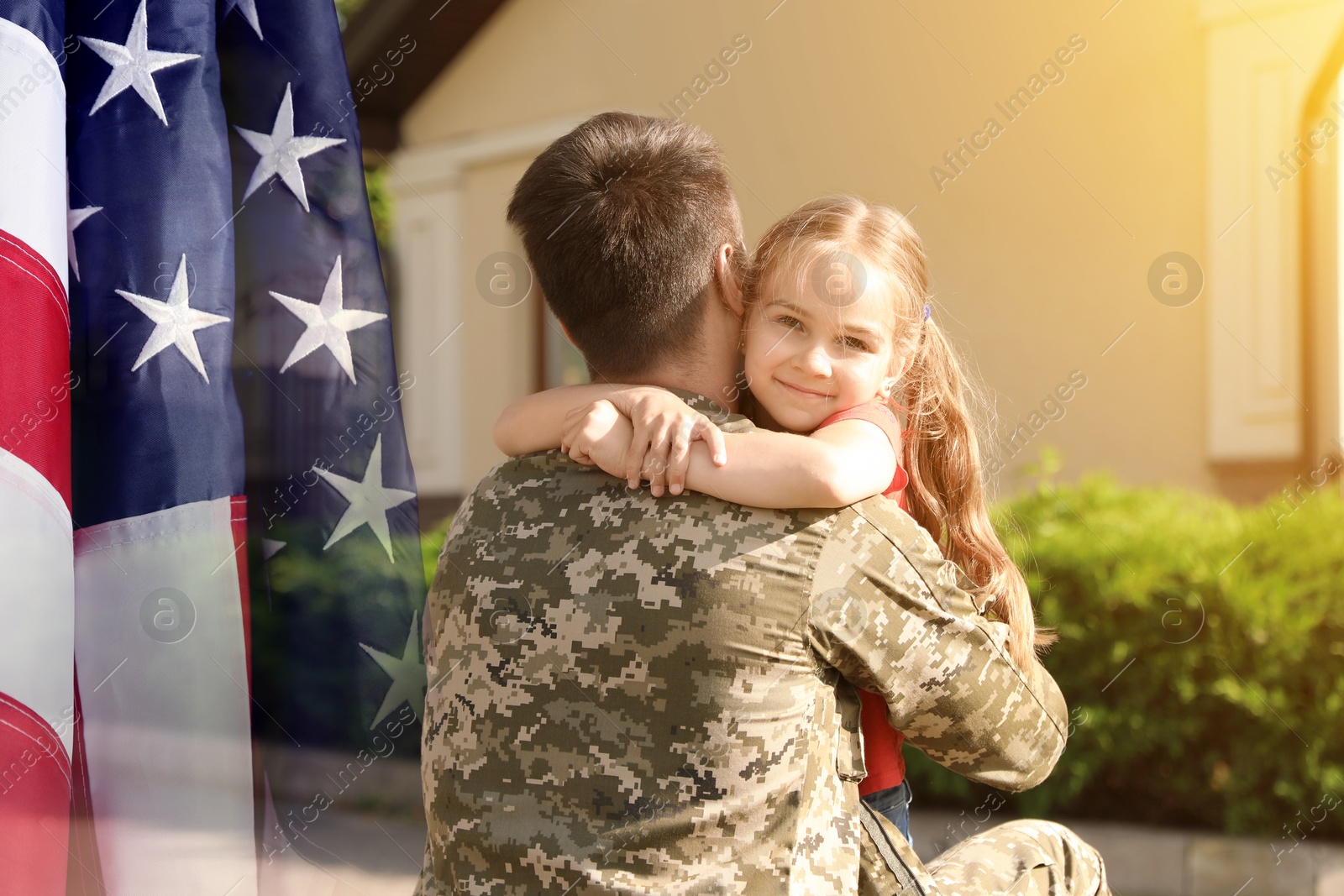 Image of Military man and his daughter outdoors, double exposure with national flag of USA