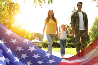 Image of Military man walking with his family outdoors, double exposure with national flag of USA