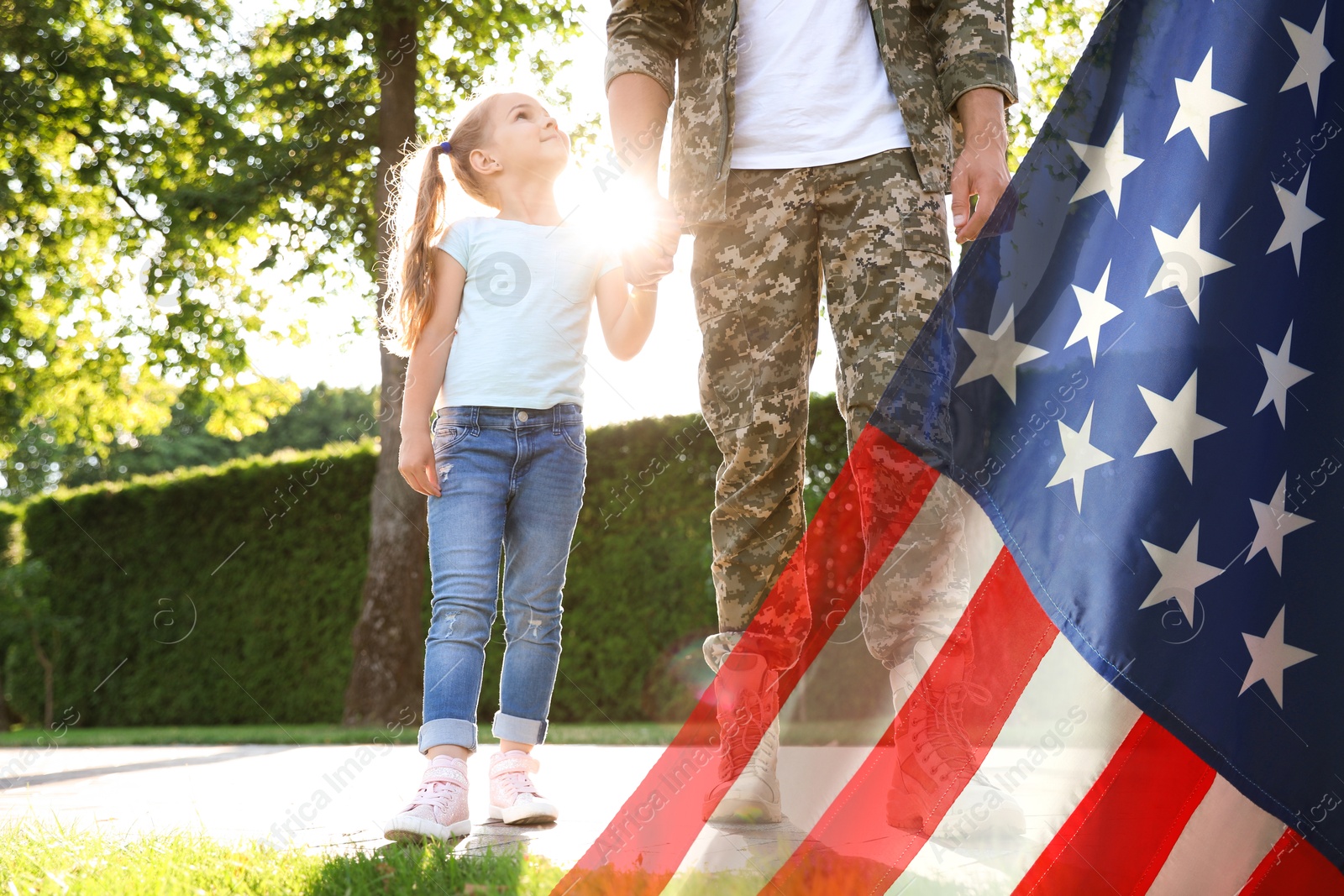 Image of Military man and his daughter outdoors, double exposure with national flag of USA
