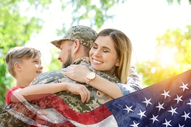 Image of Military man and his family outdoors, double exposure with national flag of USA