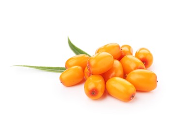 Photo of Fresh sea buckthorn berries and green leaves isolated on white