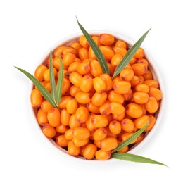 Photo of Fresh sea buckthorn berries with green leaves in bowl isolated on white, top view