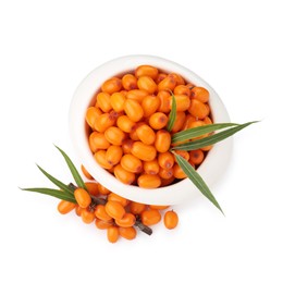 Photo of Fresh sea buckthorn berries with green leaves isolated on white, top view