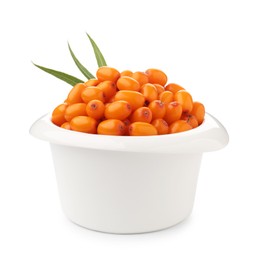 Photo of Fresh sea buckthorn berries with green leaves isolated on white