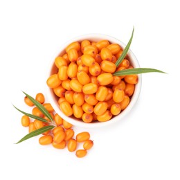 Photo of Fresh sea buckthorn berries with green leaves isolated on white, top view