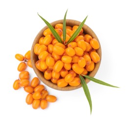 Photo of Fresh sea buckthorn berries with green leaves isolated on white, top view