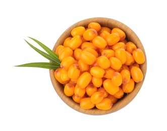 Photo of Fresh sea buckthorn berries with green leaves in bowl isolated on white, top view