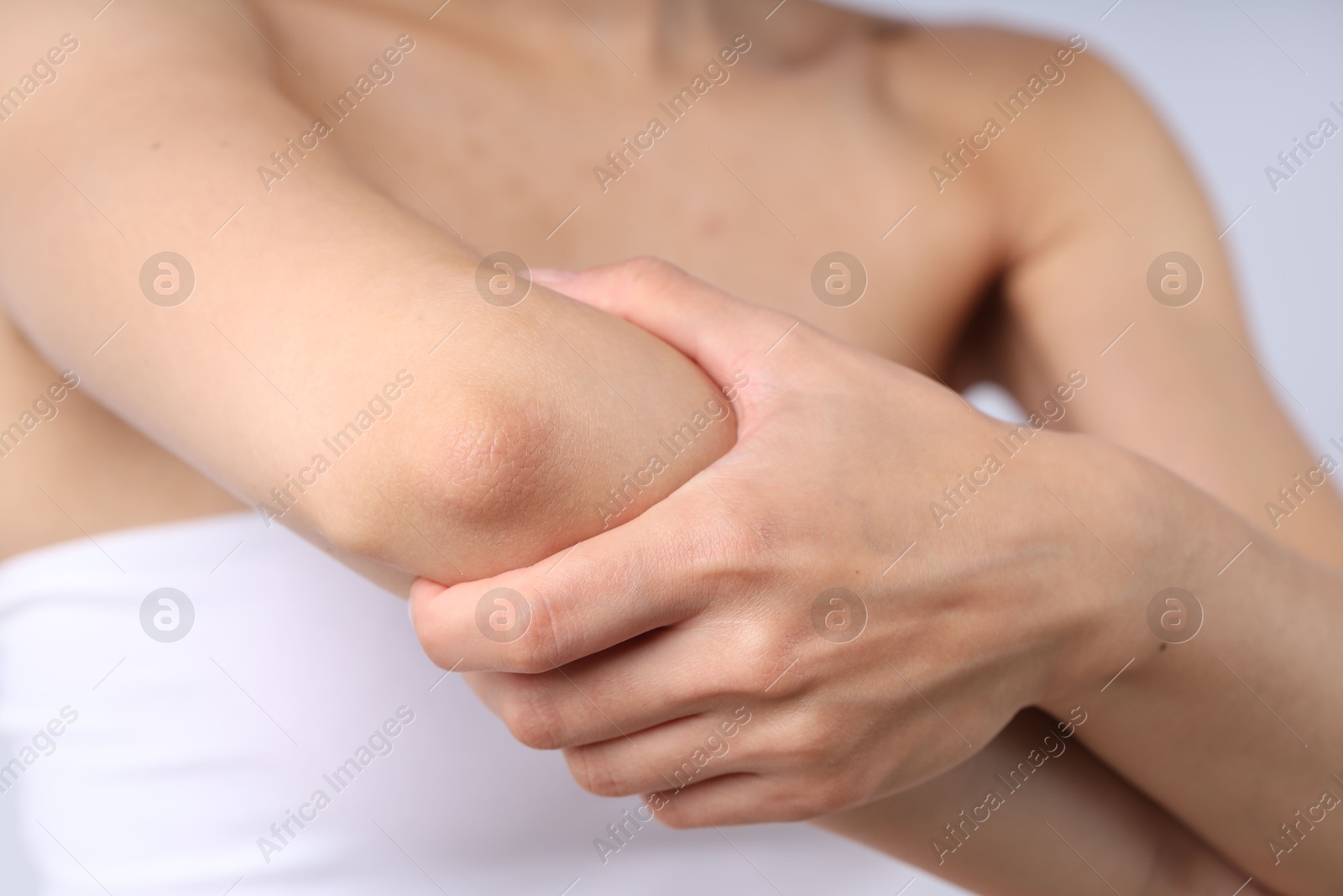Photo of Woman with normal skin on light background, closeup
