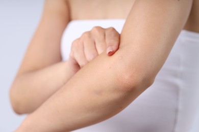 Photo of Woman with normal skin on light background, closeup