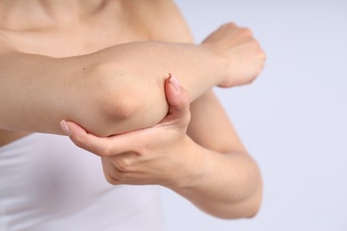 Photo of Woman with normal skin on light background, closeup
