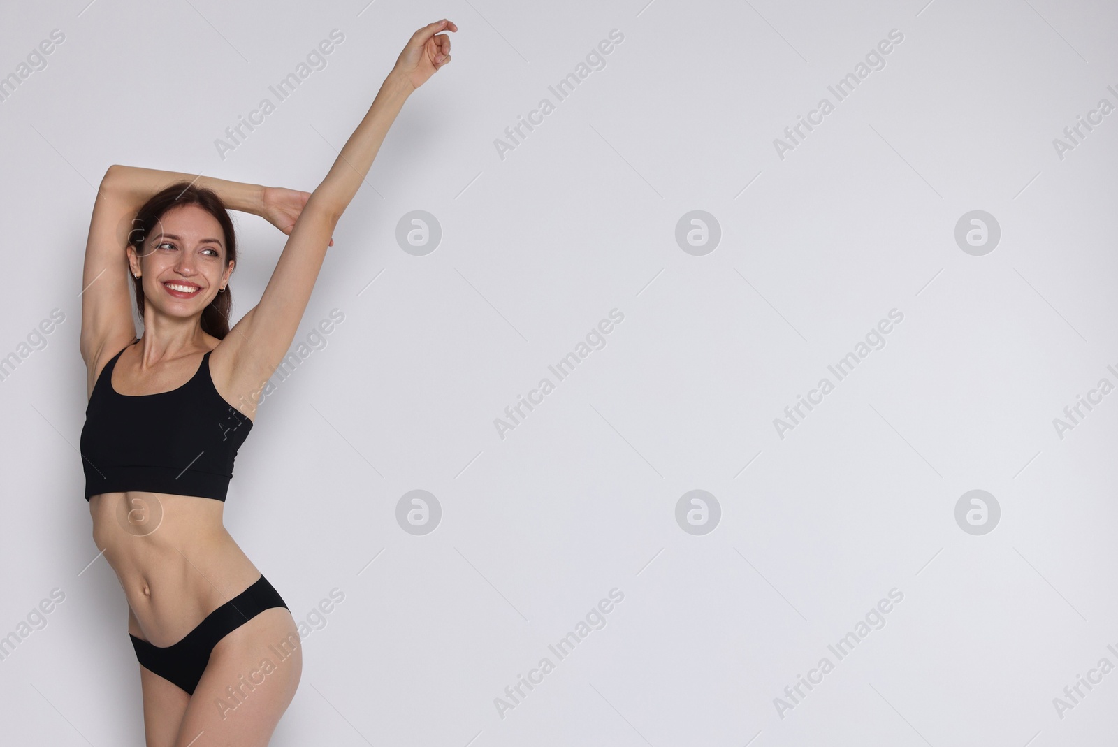 Photo of Woman with slim body on white background, space for text