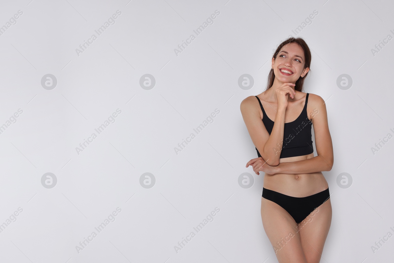 Photo of Woman with slim body on white background, space for text