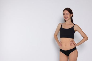 Photo of Woman with slim body on white background, space for text