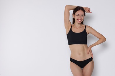 Photo of Woman with slim body on white background, space for text
