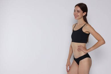 Photo of Woman with slim body on white background, space for text