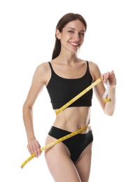 Photo of Woman with slim body and measuring tape on white background