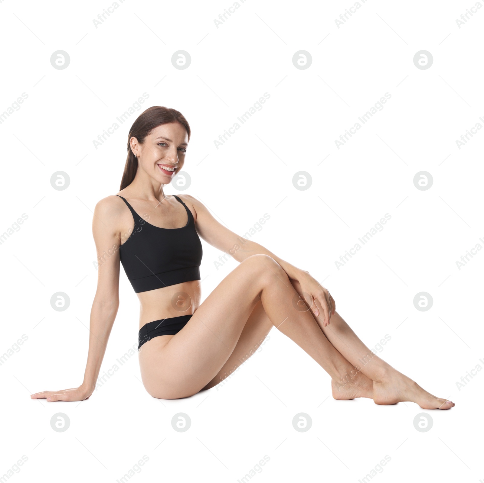 Photo of Woman with slim body on white background