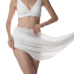 Photo of Woman covering her slim body with silk fabric on white background, closeup