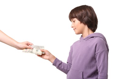 Photo of Mom giving her son pocket money on white background, closeup