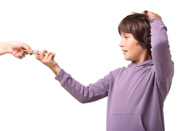 Photo of Mom giving her son pocket money on white background, closeup