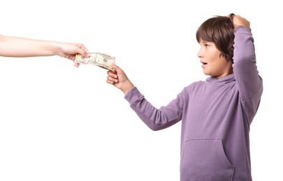 Photo of Mom giving her son pocket money on white background, closeup
