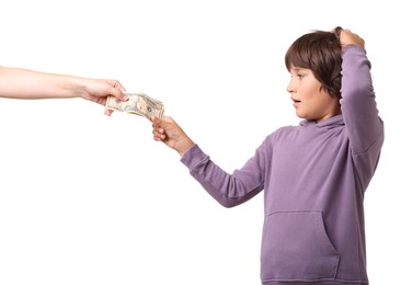 Photo of Mom giving her son pocket money on white background, closeup