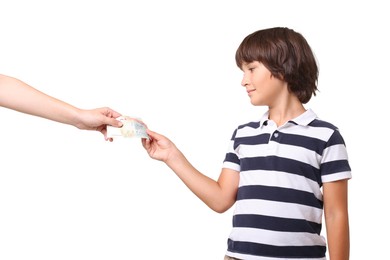 Photo of Mom giving her son pocket money on white background, closeup