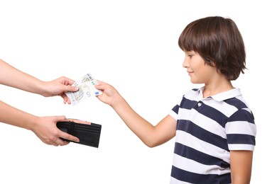 Photo of Mom giving her son pocket money on white background, closeup