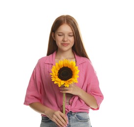 Photo of Teenage girl with beautiful sunflower on white background