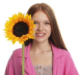 Photo of Teenage girl with beautiful sunflower on white background